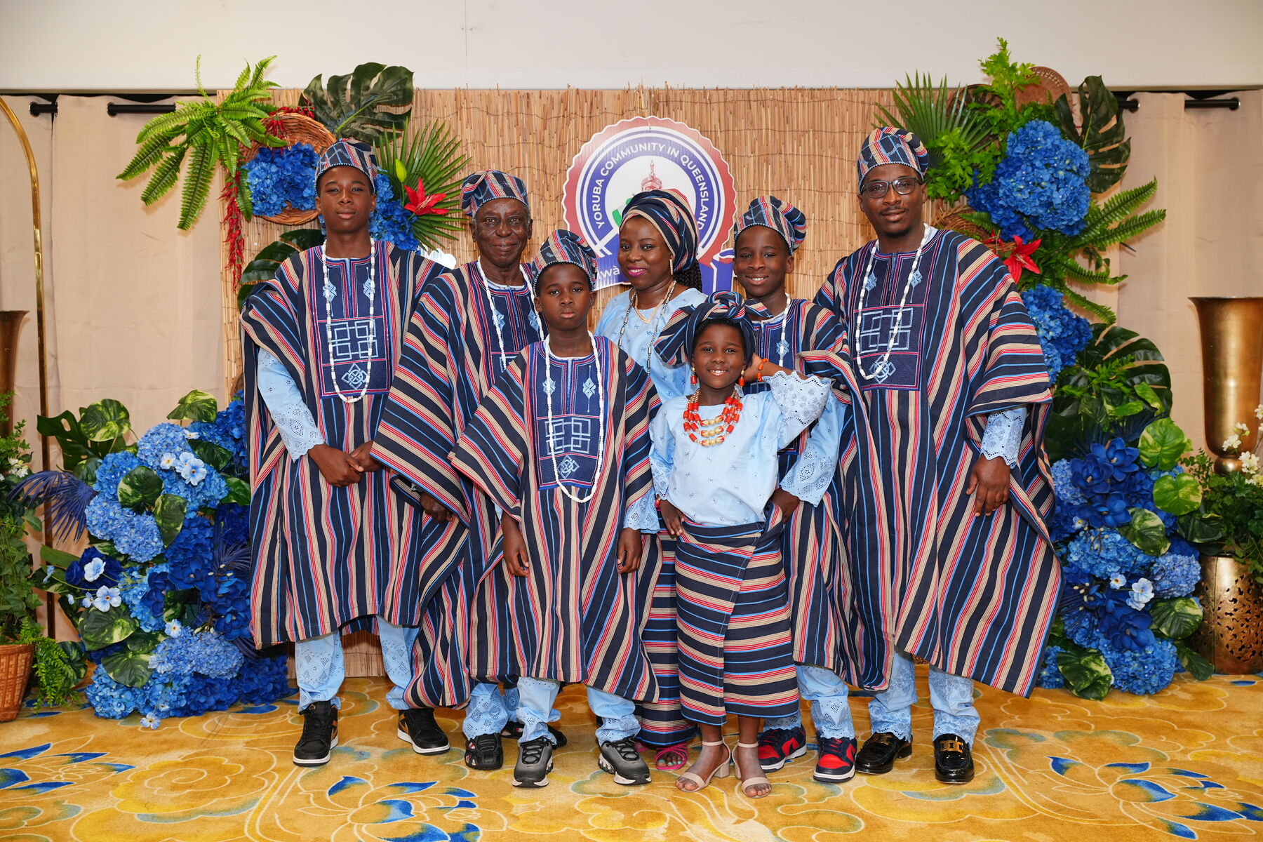 Family in traditional Yoruba attire at the Owambe