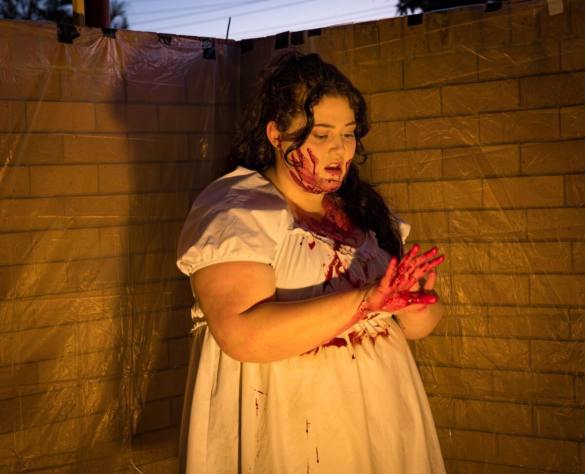 Sarah McNally in character on the set of Weed Killer